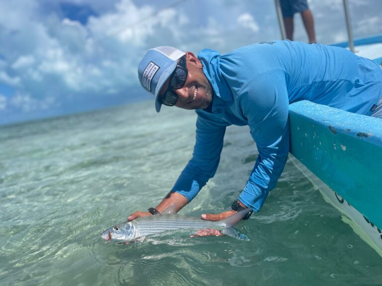 Benny Blanco catching a permit in the water of Ascension Bay, Mexico.