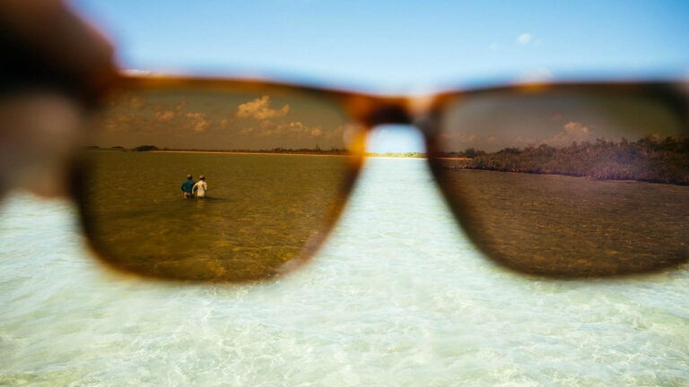 Artistic view of inshore fly fishermen of Ascension Bay through someones sunglasses.